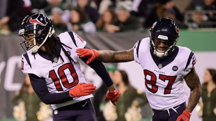 EAST RUTHERFORD, NJ - DECEMBER 15: Wide receiver DeAndre Hopkins #10 of the Houston Texans celebrates scoring a touchdown with teammate wide receiver Demaryius Thomas #87 against the New York Jets during the second quarter at MetLife Stadium on December 15, 2018 in East Rutherford, New Jersey. (Photo by Steven Ryan/Getty Images)