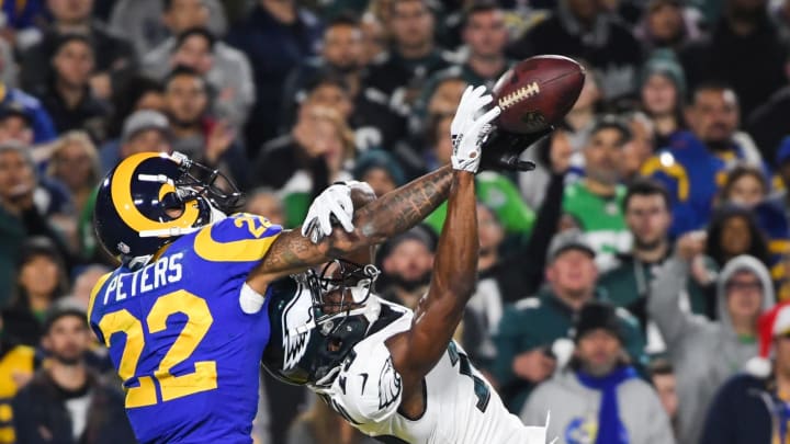LOS ANGELES, CA – DECEMBER 16: Cornerback Marcus Peters #22 of the Los Angeles Rams breaks up a pass to wide receiver Nelson Agholor #13 of the Philadelphia Eagles during the second quarter at Los Angeles Memorial Coliseum on December 16, 2018 in Los Angeles, California. (Photo by Harry How/Getty Images)