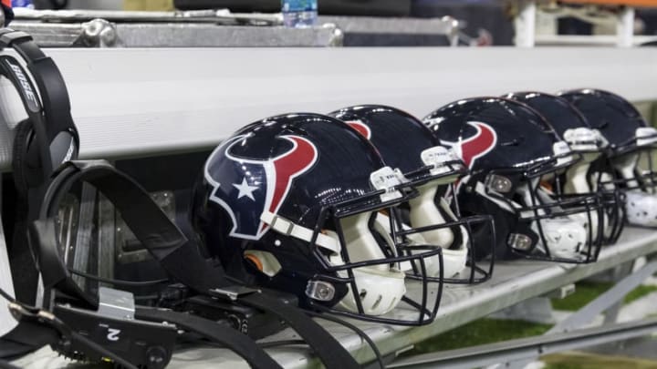 HOUSTON, TX - DECEMBER 24: A general view of Bose headsets and Houston Texans helmets on the bench before the game against the Cincinnati Bengals at NRG Stadium on December 24, 2016 in Houston, Texas. (Photo by Tim Warner/Getty Images)