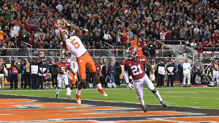 SANTA CLARA, CA – JANUARY 07: Tee Higgins #5 of the Clemson Tigers makes a third quarter touchdown catch against the Alabama Crimson Tide in the CFP National Championship presented by AT&T at Levi’s Stadium on January 7, 2019 in Santa Clara, California. (Photo by Thearon W. Henderson/Getty Images)
