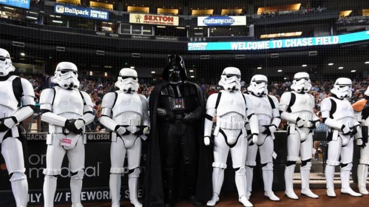 PHOENIX, AZ - JUNE 24: Darth Vader, center, stands behind home plate with some Stormtroopers prior to a game between the Arizona Diamondbacks and the Philadelphia Phillies at Chase Field on June 24, 2017 in Phoenix, Arizona. The Diamondbacks held Star Wars Night at the ballpark. (Photo by Norm Hall/Getty Images)