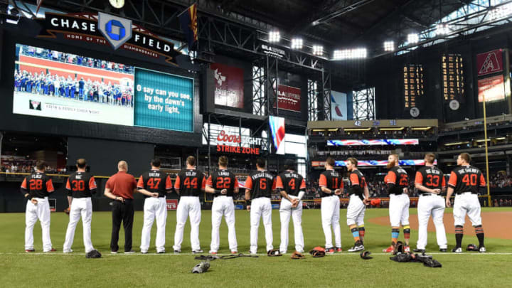PHOENIX, AZ - AUGUST 25: Arizona Diamondbacks players stand on the left field line during the singing of the national anthem prior to a game against the San Francisco Giants at Chase Field on August 25, 2017 in Phoenix, Arizona. (Photo by Norm Hall/Getty Images) PHOENIX, AZ - AUGUST 25: Arizona Diamondbacks players stand on the left field line during the singing of the national anthem prior to a game against the San Francisco Giants at Chase Field on August 25, 2017 in Phoenix, Arizona. (Photo by Norm Hall/Getty Images)