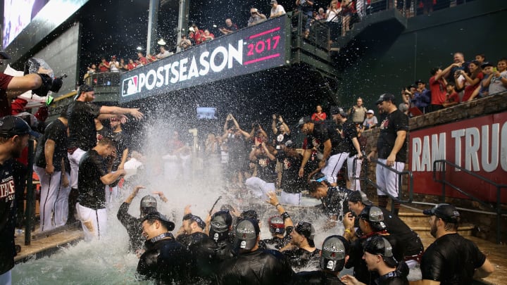 PHOENIX, AZ – SEPTEMBER 24: The Arizona Diamondbacks celebrate in the outfield pool after defeating the Miami Marlins and clinching a post season birth following the MLB game at Chase Field on September 24, 2017 in Phoenix, Arizona. The Diamondbacks defeated the Marlins 3-2. (Photo by Christian Petersen/Getty Images)