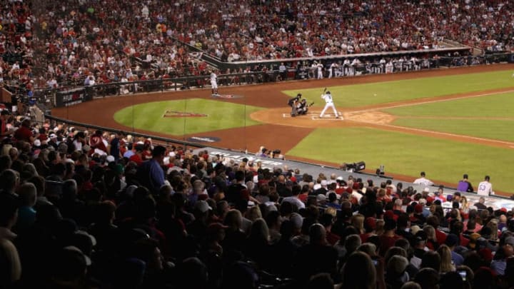 PHOENIX, AZ - OCTOBER 04: David Peralta #6 of the Arizona Diamondbacks bats against the Colorado Rockies during the frist inning of the National League Wild Card game at Chase Field on October 4, 2017 in Phoenix, Arizona. (Photo by Christian Petersen/Getty Images)