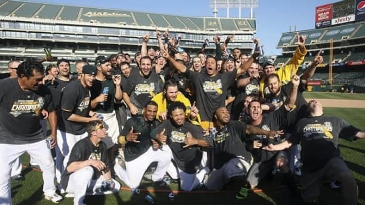 October 3, 2012; Oakland, CA, USA; Oakland Athletics celebrate after the win against the Texas Rangers at O.co Coliseum. The Oakland Athletics defeated the Texas Rangers 12-5 to become the American League west champions. Mandatory Credit: Kelley L Cox-USA TODAY Sports