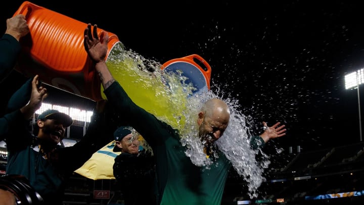 OAKLAND, CA – MAY 07: Mike Fiers #50 of the Oakland Athletics has Gatorade poured on him by teammates after pitching a no-hitter against the Cincinnati Reds at the Oakland Coliseum on May 7, 2019, in Oakland, California. The Oakland Athletics defeated the Cincinnati Reds 2-0. (Photo by Jason O. Watson/Getty Images)