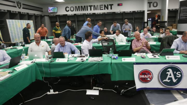 OAKLAND, CA - JUNE 3: A view of the Oakland Athletics draft room after they make their first round pick in the MLB draft, during the opening day of the 2019 MLB draft, at the Oakland-Alameda County Coliseum on June 3, 2019 in Oakland, California. (Photo by Michael Zagaris/Oakland Athletics/Getty Images) OAKLAND, CA - JUNE 3: A view of the Oakland Athletics draft room after they make their first round pick in the MLB draft, during the opening day of the 2019 MLB draft, at the Oakland-Alameda County Coliseum on June 3, 2019 in Oakland, California. (Photo by Michael Zagaris/Oakland Athletics/Getty Images)