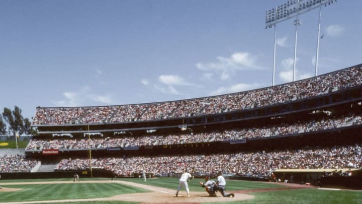 OAKLAND - MAY 20: A general view of the Oakland-Alameda County Coliseum with the on deck circle in foreground with the Oakland A's team logo during a Major League Baseball game between the visiting Boston Red Sox and the Oakland A's played May 20, 1989 in Oakland, California. (Photo by David Madison/Getty Images)