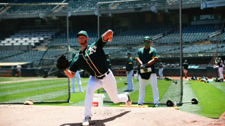 OAKLAND, CA - JULY 8: A.J. Puk #31 of the Oakland Athletics throws in the bullpen during summer workouts at RingCentral Coliseum on July 8, 2020 in Oakland, California. (Photo by Michael Zagaris/Oakland Athletics/Getty Images)