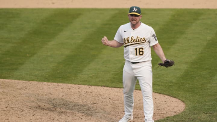 OAKLAND, CALIFORNIA - OCTOBER 01: Liam Hendriks #16 of the Oakland Athletics reacts after he strikes out Nomar Mazara #30 of the Chicago White Sox to end the game and win Game Three of the American League Wild Card Round at RingCentral Coliseum on October 01, 2020 in Oakland, California. The Athletics won the game 6-4. (Photo by Thearon W. Henderson/Getty Images)