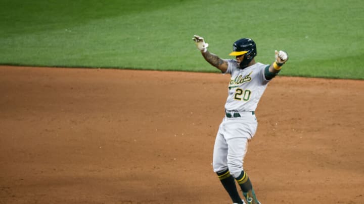 May 23, 2022; Seattle, Washington, USA; Oakland Athletics center fielder Cristian Pache (20) reacts after hitting a two-run double against the Seattle Mariners during the sixth inning at T-Mobile Park. Mandatory Credit: Joe Nicholson-USA TODAY Sports