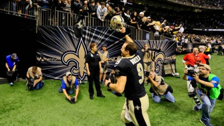 Nov 1, 2015; New Orleans, LA, USA; New Orleans Saints quarterback Drew Brees (9) celebrates after a win against the New York Giants in a game at the Mercedes-Benz Superdome. The Saints defeated the Giants 52-49. Mandatory Credit: Derick E. Hingle-USA TODAY Sports