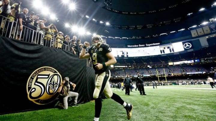 Nov 27, 2016; New Orleans, LA, USA; New Orleans Saints quarterback Drew Brees (9) celebrates as he runs off the field following a win against the Los Angeles Rams at the Mercedes-Benz Superdome. The Saints defeated the Rams 49-21. Mandatory Credit: Derick E. Hingle-USA TODAY Sports