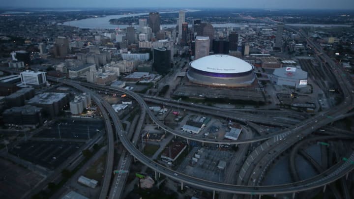 NEW ORLEANS, LA - AUGUST 24: The Mercedes-Benz Superdome stands (CENTER R) downtown on August 24, 2015 in New Orleans, Louisiana. The site was used as a 'shelter of last resort' during Hurricane Katrina. The tenth anniversary of Hurricane Katrina, which killed at least 1836 and is considered the costliest natural disaster in U.S. history, is August 29. (Photo by Mario Tama/Getty Images)