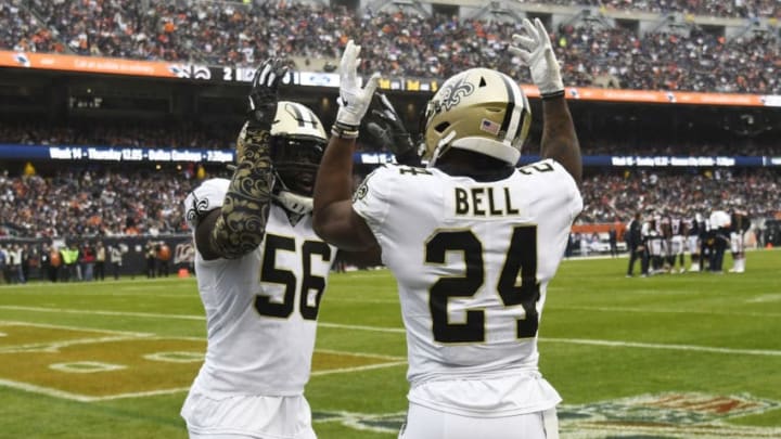 CHICAGO, ILLINOIS - OCTOBER 20: Vonn Bell #24 of the New Orleans Saints celebrates with Demario Davis #56 of the New Orleans Saints after a fumble recovery against the Chicago Bears during the first quarter at Soldier Field on October 20, 2019 in Chicago, Illinois. (Photo by David Banks/Getty Images)
