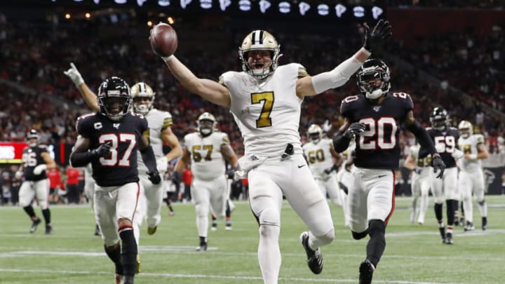 ATLANTA, GEORGIA - NOVEMBER 28: Taysom Hill #7 of the New Orleans Saints celebrates as he scores on a 30-yard touchdown run during the second quarter against the Atlanta Falcons at Mercedes-Benz Stadium on November 28, 2019 in Atlanta, Georgia. (Photo by Kevin C. Cox/Getty Images)