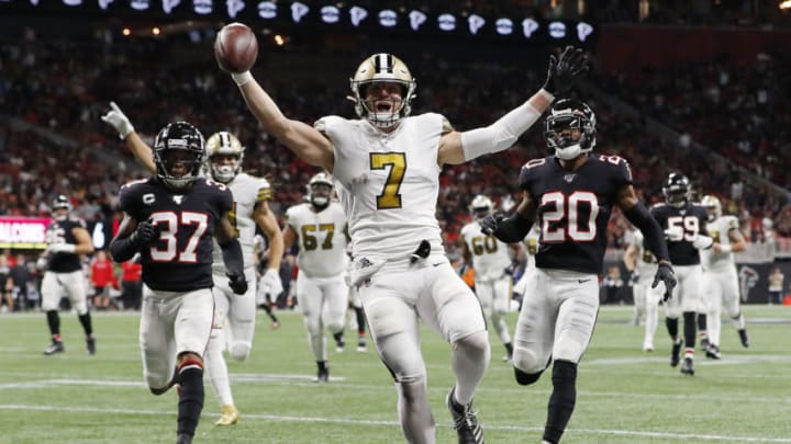 ATLANTA, GEORGIA - NOVEMBER 28: Taysom Hill #7 of the New Orleans Saints celebrates as he scores on a 30-yard touchdown run during the second quarter against the Atlanta Falcons at Mercedes-Benz Stadium on November 28, 2019 in Atlanta, Georgia. (Photo by Kevin C. Cox/Getty Images)