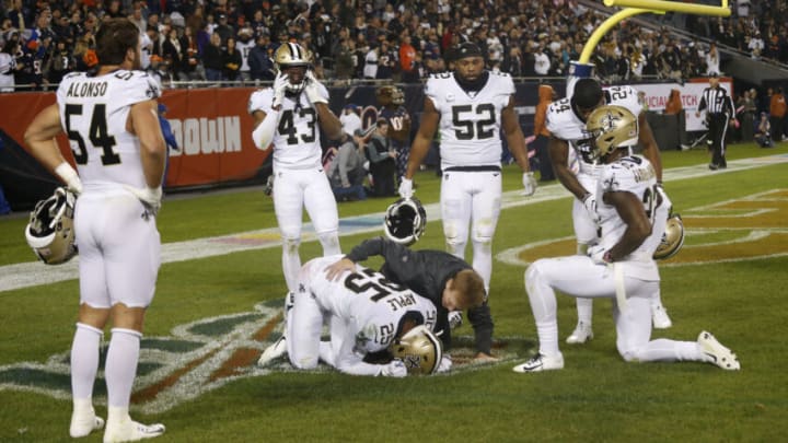 CHICAGO, ILLINOIS - OCTOBER 20: Eli Apple #25 of the New Orleans Saints gets injured late in the fourth quarter against the Chicago Bears at Soldier Field on October 20, 2019 in Chicago, Illinois. (Photo by Nuccio DiNuzzo/Getty Images)