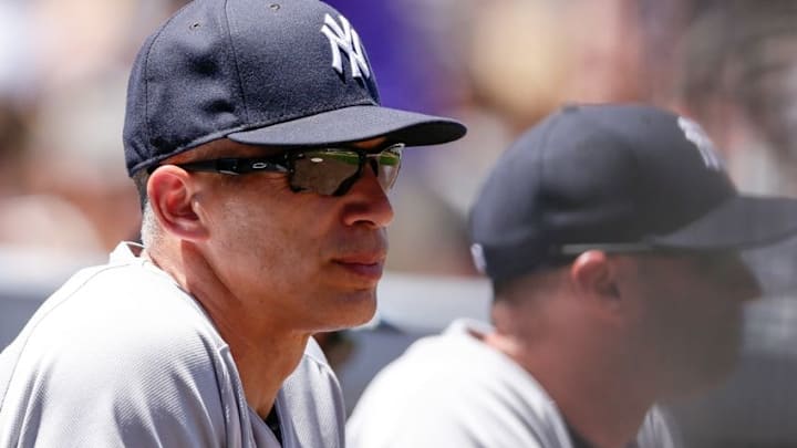 Jun 15, 2016; Denver, CO, USA; New York Yankees manager Joe Girardi (28) looks on in the first inning against the Colorado Rockies at Coors Field. Mandatory Credit: Isaiah J. Downing-USA TODAY Sports Jun 15, 2016; Denver, CO, USA; New York Yankees manager Joe Girardi (28) looks on in the first inning against the Colorado Rockies at Coors Field. Mandatory Credit: Isaiah J. Downing-USA TODAY Sports