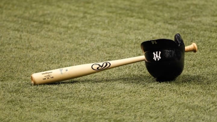 Apr 17, 2015; St. Petersburg, FL, USA; New York Yankees second baseman Stephen Drew (not pictured) helmet and bat lay on the field prior to the game against the Tampa Bay Rays at Tropicana Field. Mandatory Credit: Kim Klement-USA TODAY Sports
