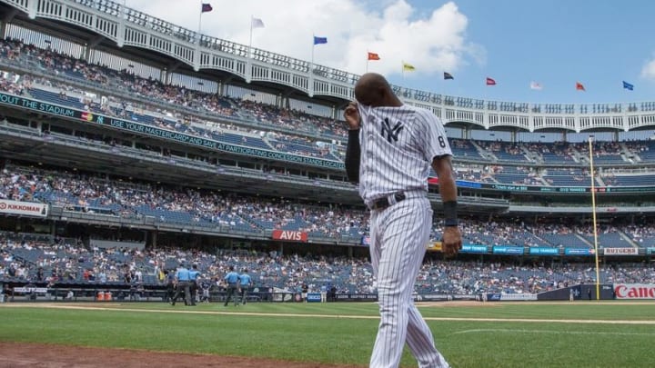 Aug 14, 2016; Bronx, NY, USA; New York Yankees right fielder Aaron Hicks (31) reacts at the end of the fifth inning against the Tampa Bay Rays at Yankee Stadium. The Tampa Bay Rays won 12-3. Mandatory Credit: Bill Streicher-USA TODAY Sports