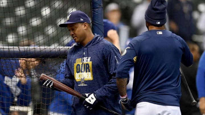 MILWAUKEE, WI - OCTOBER 12: Jonathan Schoop #5 of the Milwaukee Brewers looks at his bat prior to Game One of the National League Championship Series against the Los Angeles Dodgers at Miller Park on October 12, 2018 in Milwaukee, Wisconsin. (Photo by Stacy Revere/Getty Images) MILWAUKEE, WI - OCTOBER 12: Jonathan Schoop #5 of the Milwaukee Brewers looks at his bat prior to Game One of the National League Championship Series against the Los Angeles Dodgers at Miller Park on October 12, 2018 in Milwaukee, Wisconsin. (Photo by Stacy Revere/Getty Images)