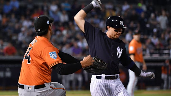TAMPA, FL - MARCH 12: Rio Ruiz #14 of the Baltimore Orioles attempts to tag Troy Tulowitzki #12 of the New York Yankees in the fourth inning during the spring training game at Steinbrenner Field on March 12, 2019 in Tampa, Florida. (Photo by Mark Brown/Getty Images) TAMPA, FL - MARCH 12: Rio Ruiz #14 of the Baltimore Orioles attempts to tag Troy Tulowitzki #12 of the New York Yankees in the fourth inning during the spring training game at Steinbrenner Field on March 12, 2019 in Tampa, Florida. (Photo by Mark Brown/Getty Images)