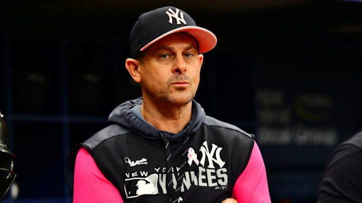 ST PETERSBURG, FLORIDA - MAY 12: Manager Aaron Boone #17 of the New York Yankees looks on during a blackout delay in the ninth inning of a baseball game against the Tampa Bay Rays at Tropicana Field on May 12, 2019 in St Petersburg, Florida. (Photo by Julio Aguilar/Getty Images) ST PETERSBURG, FLORIDA - MAY 12: Manager Aaron Boone #17 of the New York Yankees looks on during a blackout delay in the ninth inning of a baseball game against the Tampa Bay Rays at Tropicana Field on May 12, 2019 in St Petersburg, Florida. (Photo by Julio Aguilar/Getty Images)
