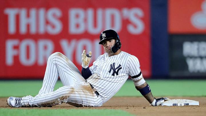 Gleyber Torres of the New York Yankees sittin' on second base (Photo by Elsa/Getty Images)