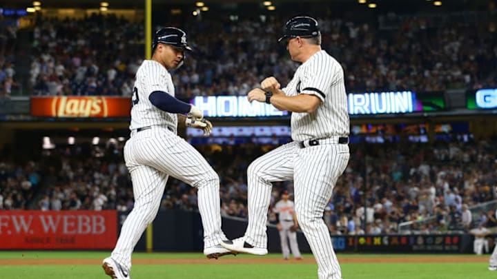 NEW YORK, NEW YORK - AUGUST 12: Gleyber Torres #25 of the New York Yankees rounds third base after hitting his second home run of the game in the sixth inning against the Baltimore Orioles at Yankee Stadium on August 12, 2019 in New York City. (Photo by Mike Stobe/Getty Images)