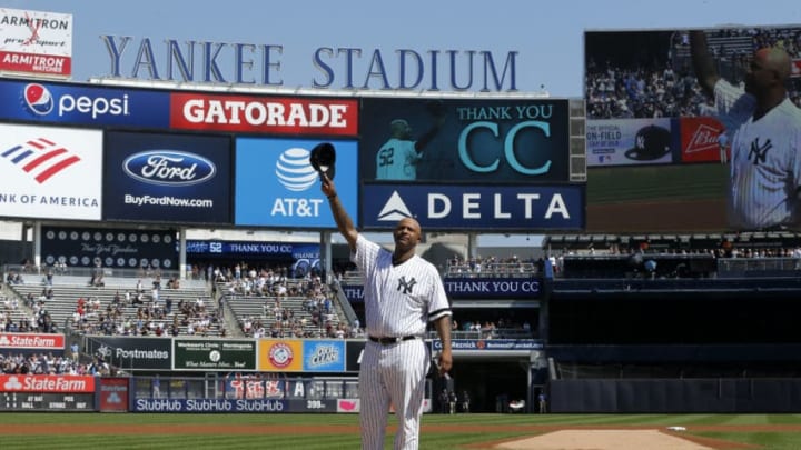 NEW YORK, NEW YORK - SEPTEMBER 22: CC Sabathia #52 of the New York Yankees salutes the crowd as he is honored prior to a game against the Toronto Blue Jays at Yankee Stadium on September 22, 2019 in the Bronx borough New York City. CC Sabathia is retiring at the end of the season. (Photo by Jim McIsaac/Getty Images)