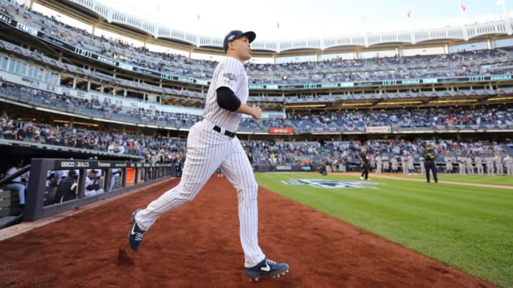 NEW YORK, NEW YORK - OCTOBER 15: Giancarlo Stanton #27 of the New York Yankees takes the field as he is introduced prior to game three of the American League Championship Series against the Houston Astros at Yankee Stadium on October 15, 2019 in New York City. (Photo by Elsa/Getty Images)
