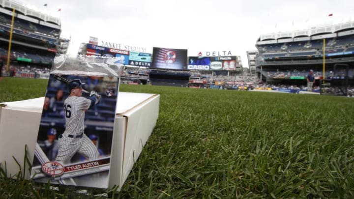 NEW YORK, NY - AUGUST 12: Packs of Topps baseball cards will be distributed to fans by players before a game between the Boston Red Sox and the New York Yankees at Yankee Stadium on August 12, 2017 in the Bronx borough of New York City. (Photo by Rich Schultz/Getty Images)