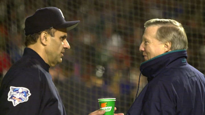 24 Oct 2000: Manager Joe Torre of the New York Yankees confers with team owner George Steinbrenner during batting practice before game three of the MLB World Series against the New York Mets at Shea Stadium in Flushing, New York.  Mandatory Credit: Ezra Shaw/ALLSPORT