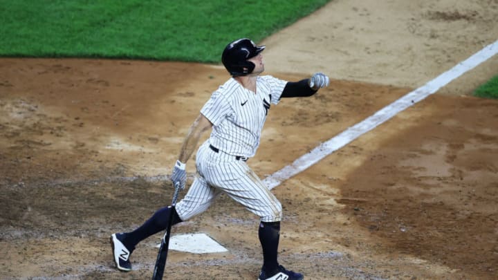 NEW YORK, NEW YORK - JULY 31: Brett Gardner #11 of the New York Yankees hits a two run eighth inning home run against the Boston Red Sox during their home opener at Yankee Stadium on July 31, 2020 in New York City. The 2020 season had been postponed since March due to the COVID-19 pandemic. (Photo by Al Bello/Getty Images)