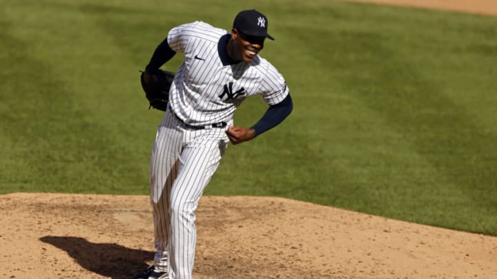 NEW YORK, NY - SEPTEMBER 12: Aroldis Chapman #54 of the New York Yankees reacts after the third out against the Baltimore Orioles during the ninth inning at Yankee Stadium on September 12, 2020 in the Bronx borough of New York City. The Yankees won 2-1. (Photo by Adam Hunger/Getty Images)