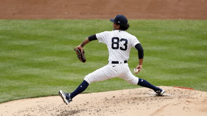 NEW YORK, NEW YORK - SEPTEMBER 26: (NEW YORK DAILIES OUT) Deivi Garcia #83 of the New York Yankees in action against the Miami Marlins at Yankee Stadium on September 26, 2020 in New York City. The Yankees defeated the Marlins 11-4. (Photo by Jim McIsaac/Getty Images)