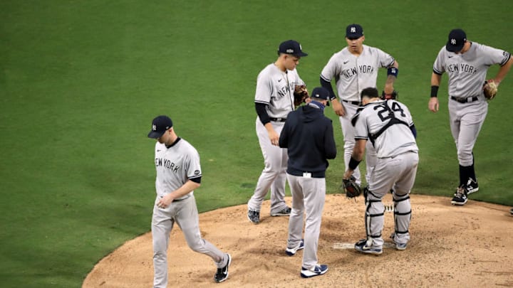 SAN DIEGO, CALIFORNIA - OCTOBER 06: J.A. Happ #33 of the New York Yankees is taken out of the game against the Tampa Bay Rays during the fourth inning in Game Two of the American League Division Series at PETCO Park on October 06, 2020 in San Diego, California. (Photo by Sean M. Haffey/Getty Images) SAN DIEGO, CALIFORNIA - OCTOBER 06: J.A. Happ #33 of the New York Yankees is taken out of the game against the Tampa Bay Rays during the fourth inning in Game Two of the American League Division Series at PETCO Park on October 06, 2020 in San Diego, California. (Photo by Sean M. Haffey/Getty Images)
