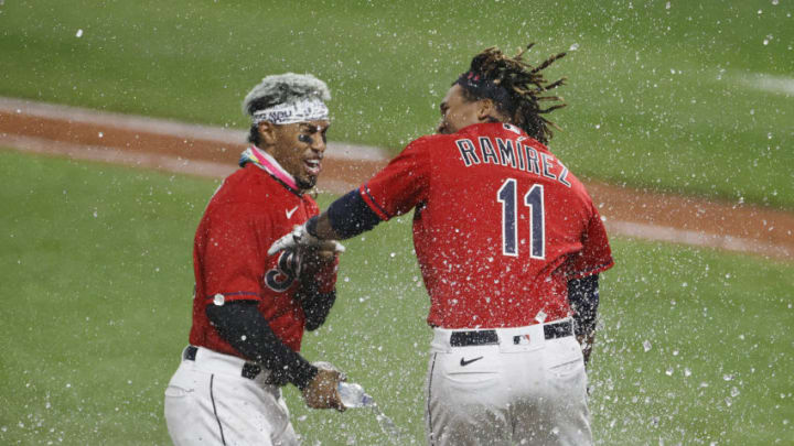 CLEVELAND, OH - SEPTEMBER 22: Jose Ramirez #11 of the Cleveland Indians celebrates with Francisco Lindor #12 after hitting a walk off three run home run off José Ruiz #66 of the Chicago White Sox during the tenth inning at Progressive Field on September 22, 2020 in Cleveland, Ohio. The Indians defeated the White Sox 5-3. (Photo by Ron Schwane/Getty Images)