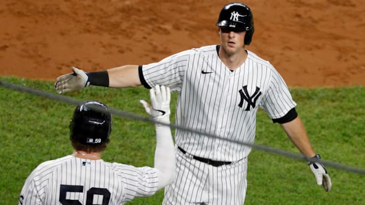 NEW YORK, NEW YORK - SEPTEMBER 17: (NEW YORK DAILIES OUT) DJ LeMahieu #26 of the New York Yankees celebrates his fourth inning home run against the Toronto Blue Jays with teammate Luke Voit #59 at Yankee Stadium on September 17, 2020 in New York City. The Yankees defeated the Blue Jays 10-7. (Photo by Jim McIsaac/Getty Images) NEW YORK, NEW YORK - SEPTEMBER 17: (NEW YORK DAILIES OUT) DJ LeMahieu #26 of the New York Yankees celebrates his fourth inning home run against the Toronto Blue Jays with teammate Luke Voit #59 at Yankee Stadium on September 17, 2020 in New York City. The Yankees defeated the Blue Jays 10-7. (Photo by Jim McIsaac/Getty Images)