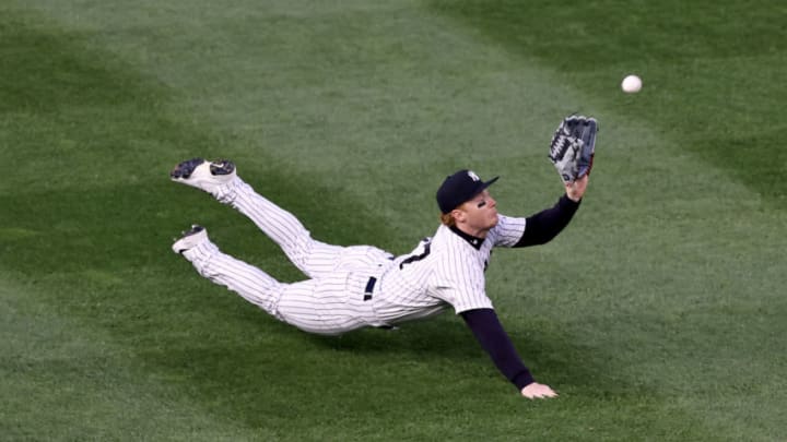 NEW YORK, NEW YORK - APRIL 21: Clint Frazier #77 of the New York Yankees catches a hit by Guillermo Heredia of the Atlanta Braves in the third inning at Yankee Stadium on April 21, 2021 in the Bronx borough of New York City. (Photo by Elsa/Getty Images) NEW YORK, NEW YORK - APRIL 21: Clint Frazier #77 of the New York Yankees catches a hit by Guillermo Heredia of the Atlanta Braves in the third inning at Yankee Stadium on April 21, 2021 in the Bronx borough of New York City. (Photo by Elsa/Getty Images)