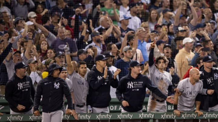 BOSTON, MA - SEPTEMBER 26: Members of the New York Yankees react after a go ahead RBI double during the eighth inning of a game against the Boston Red Sox on September 26, 2021 at Fenway Park in Boston, Massachusetts. (Photo by Billie Weiss/Boston Red Sox/Getty Images)