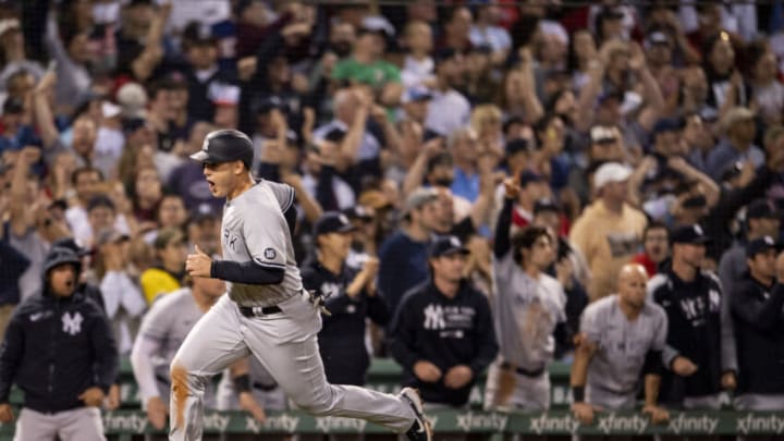 BOSTON, MA - SEPTEMBER 26: Anthony Rizzo #48 of the New York Yankees reacts as he scores on a go ahead RBI double during the eighth inning of a game against the Boston Red Sox on September 26, 2021 at Fenway Park in Boston, Massachusetts. (Photo by Billie Weiss/Boston Red Sox/Getty Images)