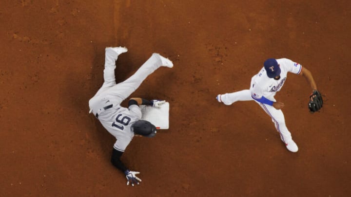 ARLINGTON, TX - OCTOBER 04: Oswald Peraza #91 of the New York Yankees steals second base during a game against the Texas Rangers at Globe Life Field on October 4, 2022 in Arlington, Texas. (Photo by Ben Ludeman/Texas Rangers/Getty Images)