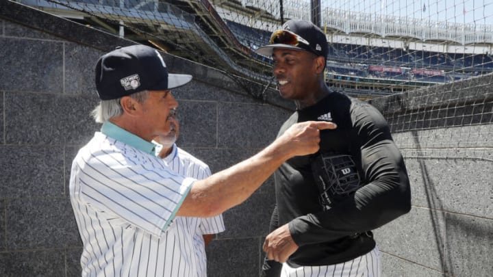 NEW YORK, NEW YORK - JULY 30: (NEW YORK DAILIES OUT) Ron Guidry (L) talks with Aroldis Chapman #54 during New York Yankees Old Timers' Day before a game against the Kansas City Royals at Yankee Stadium on Saturday, July 30, 2022 in New York City. The Yankees defeated the Royals 8-2. (Photo by Jim McIsaac/Getty Images)