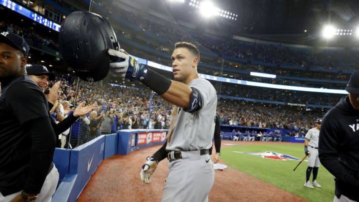 TORONTO, ON - SEPTEMBER 28: Aaron Judge #99 of the New York Yankees salutes the fans after he hits his 61st home run of the season to tie Roger Maris for the American League record during the game against the Toronto Blue Jays at Rogers Centre on September 28, 2022 in Toronto, Canada. (Photo by New York Yankees/Getty Images)