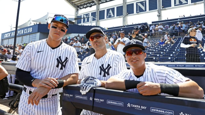 TAMPA, FL - MARCH 20: Aaron Judge #99, Giancarlo Stanton #27 and Anthony Volpe of the New York Yankees pose for a photo before a spring training game against the Detroit Tigers on March 20, 2022, at George M. Steinbrenner Field in Tampa, Florida. (Photo by New York Yankees/Getty Images)