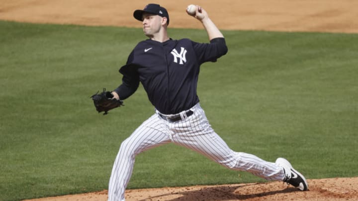 Feb 25, 2021; Tampa, Florida, USA; New York Yankees pitcher Lucas Luetge (63) throws a pitch during a simulated game at George M. Steinbrenner Field. Mandatory Credit: Kim Klement-USA TODAY Sports