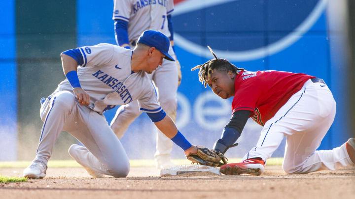 Cleveland Guardians' Jose Ramirez steals second base as Kansas City Royals' Nicky Lopez is late with the tag during the fourth inning of a baseball game in Cleveland, Tuesday, May 31, 2022. (AP Photo/Phil Long) Cleveland Guardians' Jose Ramirez steals second base as Kansas City Royals' Nicky Lopez is late with the tag during the fourth inning of a baseball game in Cleveland, Tuesday, May 31, 2022. (AP Photo/Phil Long)