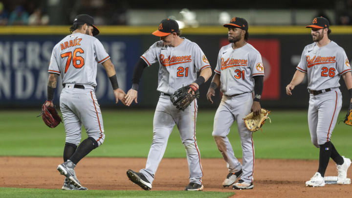 Baltimore Orioles including, from left, Jonathan Arauz, Austin Hays, Cedric Mullins and Ryan McKenna celebrate after a baseball game against the Seattle Mariners, Monday, June 27, 2022, in Seattle. The Orioles won 9-2. (AP Photo/Stephen Brashear) Baltimore Orioles including, from left, Jonathan Arauz, Austin Hays, Cedric Mullins and Ryan McKenna celebrate after a baseball game against the Seattle Mariners, Monday, June 27, 2022, in Seattle. The Orioles won 9-2. (AP Photo/Stephen Brashear)